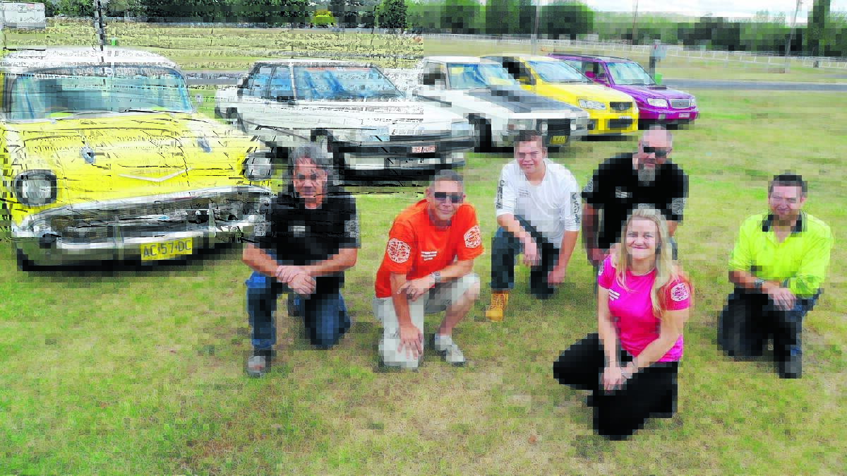 ON WITH THE SHOW: George Georgiou, Shane and Ryan Hovey, Jason Smith,  Mitzi Cronk and Christopher Weston are gearing up for this Sunday’s Southern Cross Street Cruisers Swap Meet, Car, Bike and Truck Show. Photo: Steve Gosch                                                                                  0317sgswap