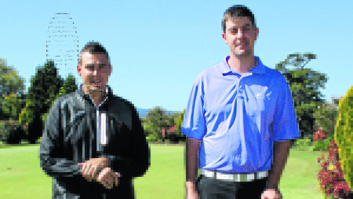 BIG MAN: Wentworth professional Tod Iffland (left) with former Duntryleague professional Julian Reynolds who has bone cancer. A benefit day will be held for Reynolds at his old club on Friday. Photo: MICHELLE COOK  0425mcpros1
