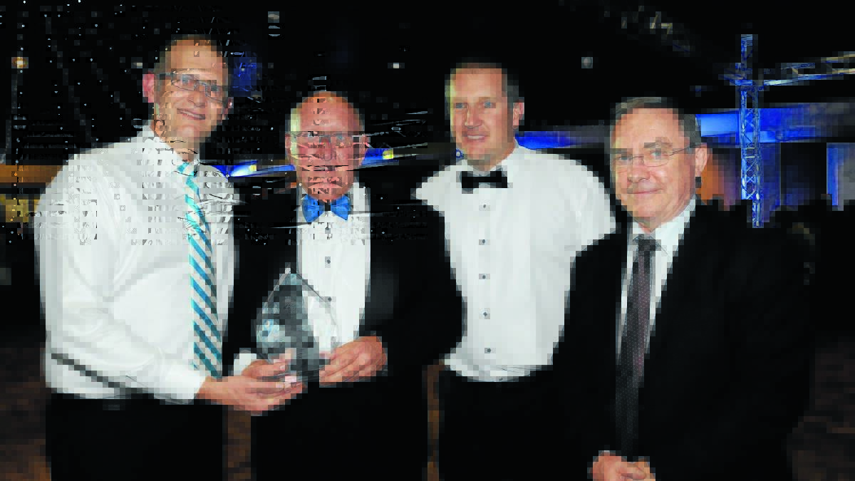 TOP BUSINESS: PYBAR chief services officer Andrew Rouse, chief executive officer Paul Rouse and director and chief operating officer Brendan Rouse with former CGU regional manager Allan Train after PYBAR won the prestigious Banjo business of the year at Friday night’s CGU Banjo Business Awards.
Photo: STEVE GOSCH 0213sgawards26