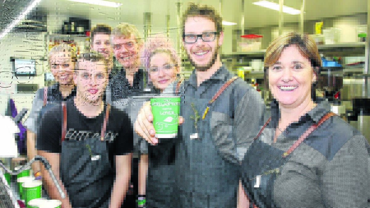 DOING IT FOR DIGGERS AND LEGACY: Scrumptious on Summer staff (back) Bronte Glasby, Justin Sandry, Max Glasby, Alice Middleton, (front) Chris Rothnie, Russell Bourke and Suzy Glasby donated their time to the Legacy fundraiser yesterday.
Photo: STEVE GOSCH 0425coffee 1
