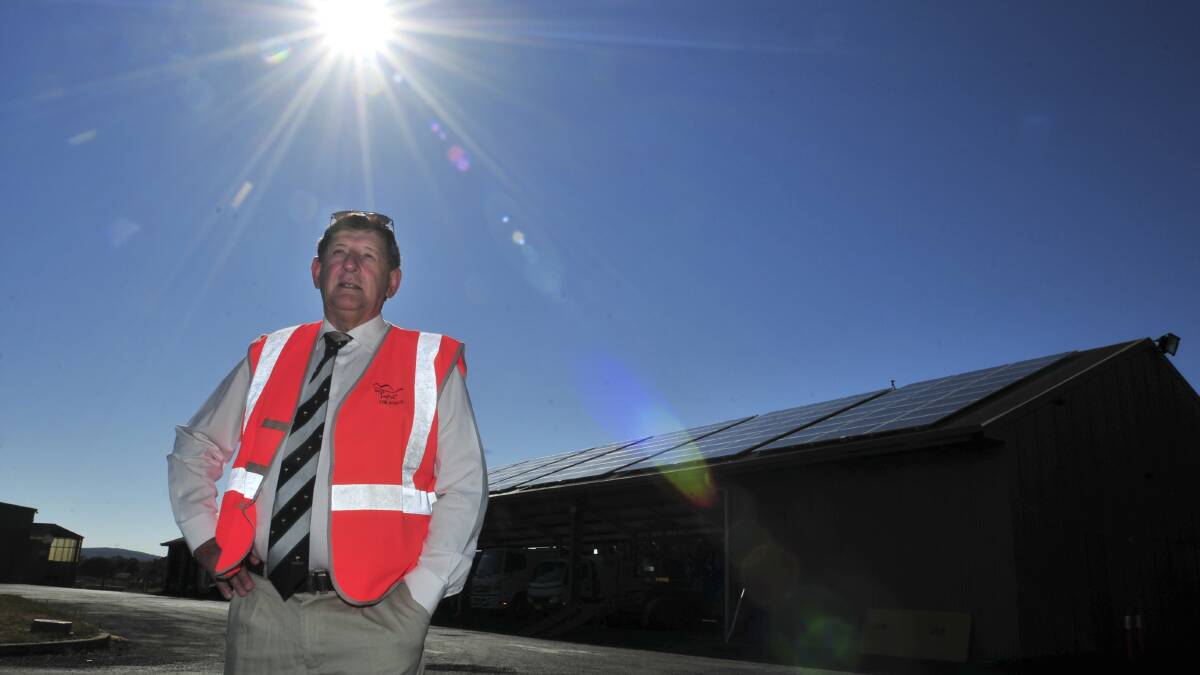 turning up the heat: Orange City councillor Reg Kidd believes the 140 solar panels on the roof of council’s works depot should inspire businesses and clubs to look into the benefits of solar panels. Photo: JUDE KEOGH                                                                                                             0207solar1

