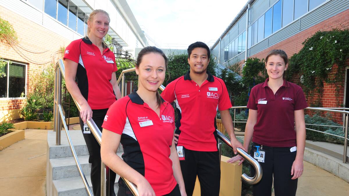 ACUTE CARE: Eloise Cook, Christine Fletcher,  Chris Howard and Hannah Gaylor are now into their third week of a physiotherapy placement at Orange hospital focusing on acute care patients. Photo: JUDE KEOGH                                                                                                                           0424physio3