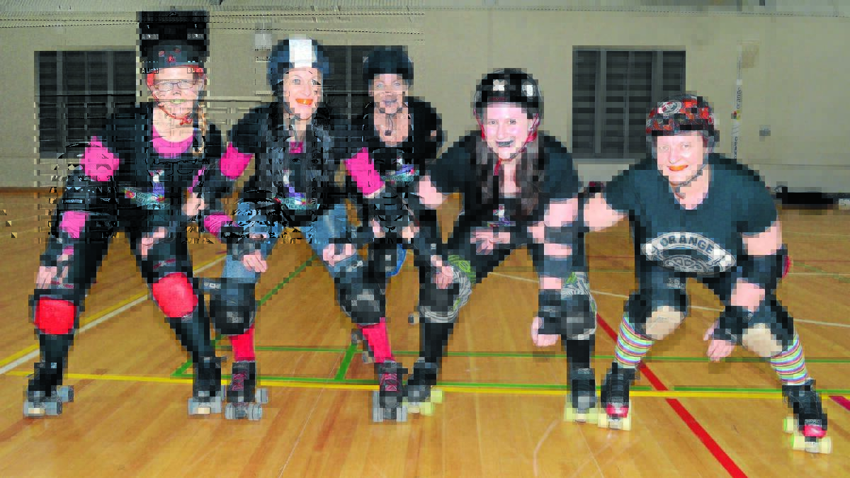 ON TRACK FOR ACTION: Orange Roller Derby League members Tamara “Fury” Gross, who is now qualified to be trained in roller derby after completing a recent beginner course, Leanne “Le’Evil Kni’Evil” McCulloch, Vanessa “Mad Mixie” Taylor, Kate “Robyn Zombie” Smith and Sharon “Tinkers Toss’ Tilston.
 Photo: JUDE KEOGH  0910rollerderby1