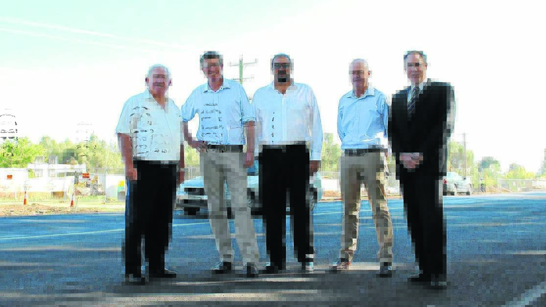 SEALING THE DEAL: Orange mayor John Davis, member for Orange Andrew Gee, Orange City Council general manager Garry Styles, Cabonne mayor Michael Hayes and shire general manager Andrew Hopkins at the $4 million roads announcement. Photo: SUPPLIED 