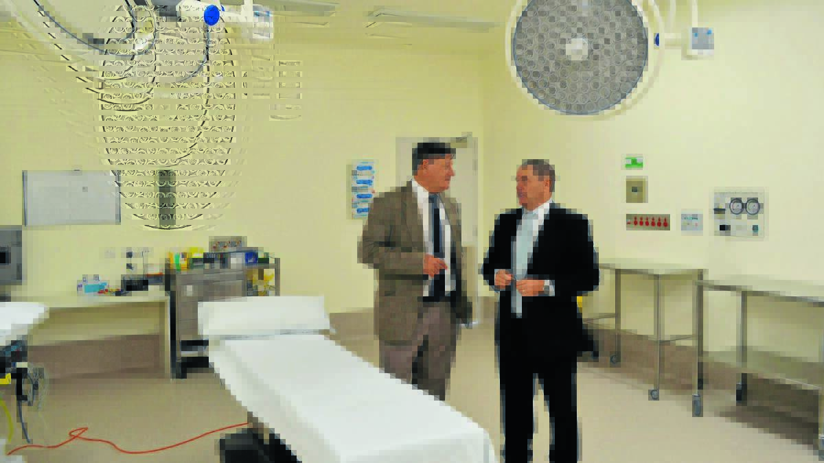 HOSPITAL BOOST: Member for Calare John Cobb and Dudley Private Hospital chief executive officer Trevor Matheson inside one of the hospital’s new theatre rooms. 
Photo: BRYANT HEVESI 0313bhdudley4