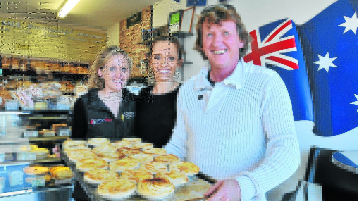 MOVING ON: Whitey’s Pies workers Billie White and Rachael Gander have farewelled their father and business namesake Geoff White who stepped away from the business yesterday with the intention of travelling for a year. Photo: JUDE KEOGH                                                     0731whitey1
