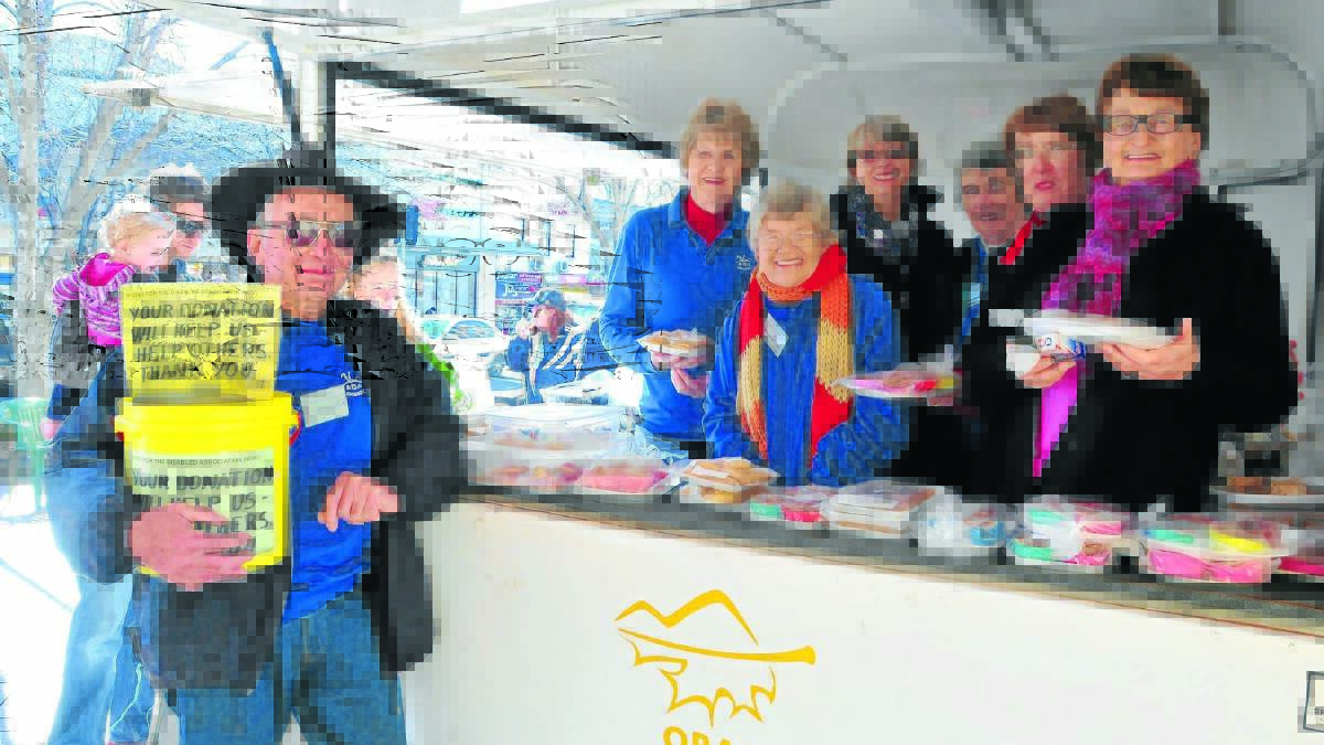 HELPING OTHERS: Riding for the Disabled volunteers (l-r) Pat Frecklington, Robyn Livermore, Barbara Edge, Elizabeth Carroll, Helen Southwell, Marj Strong and Joyce Collett want to thank Orange residents who donated money last Friday. 
Photo: JUDE KEOGH 0808rdastall
