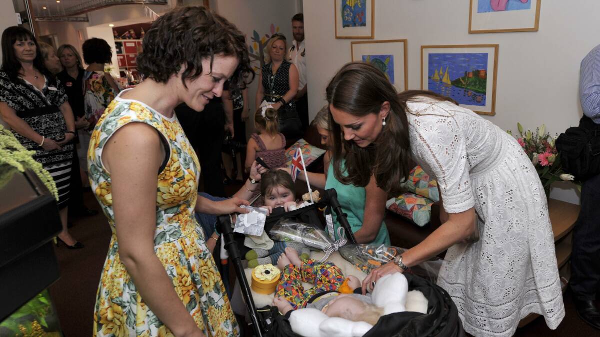 TOUCHING: Rob, Amy and Max McIntyre from Dubbo with the Duchess of Cambridge at children's hospice Bear Cottage. Photo: GETTY IMAGES
