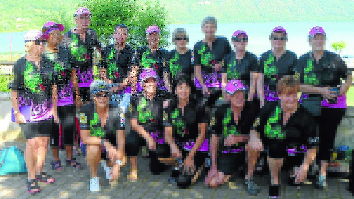 TRAINING TIME: The Pinnacle Dragons Abreast team (back row) Anne Warnock, Alison Worrel, George Butcher, Jordan Micallef, Kay Rutherford, Susie Fletcher, Ros Kemp, Ella Ferrari, Maureen McDonald and Yvonne Artery with (front row) Beth Jacobs, Pearl Butcher, Lisa Syme, Warren Artery and Jo Kratz at Lago Albano, south east of Rome, where they trained in preparation for the Vogalonga. 
Photo: CONTRIBUTED