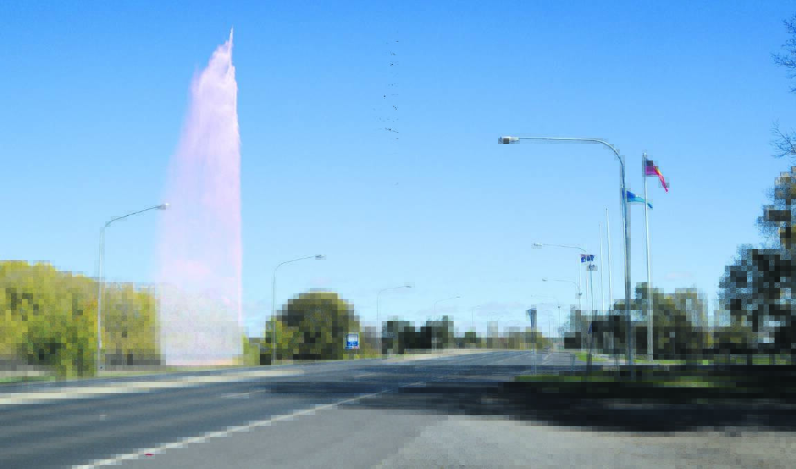 WELCOME TO BATHURST: In years to come the major gateway into Bathurst from Sydney could have a major water feature beside the Evans Bridge, like the one in this digitally enhanced image featuring the geyser-like fountain from Lake Burley Griffin in Canberra.