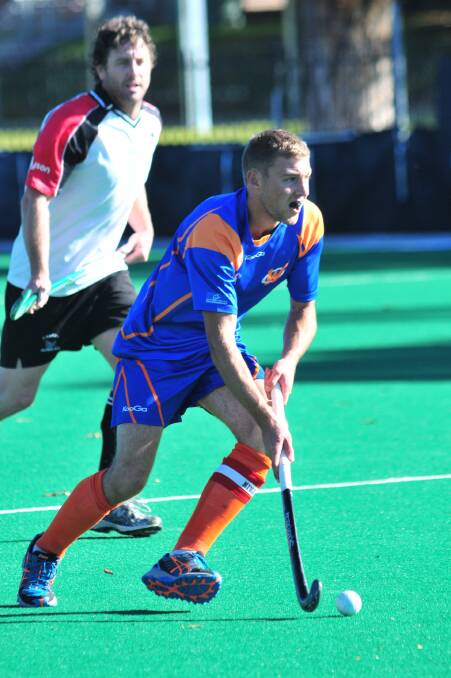 STARRING ROLE: Nick Sharp has been one of Orange's best at the NSW Hockey Men's Open Field State Championships, baggiing a double against Crookwell.        Photo: JUDE KEOGH 0427menhock3