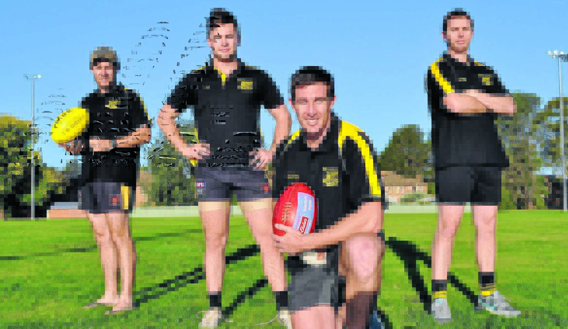 LEADING FROM THE FRONT: Tigers leadership group members (from left) Corey McKenzie (backline), Michael Rothnie (vice-captain), Tim Barry (captain) and Dale Hunter (forward line) prepare to lead the black and golds in the clu­b’s 2014 Central West AFL premiership defence. Photo: NICK McGRATH 0401nmafl