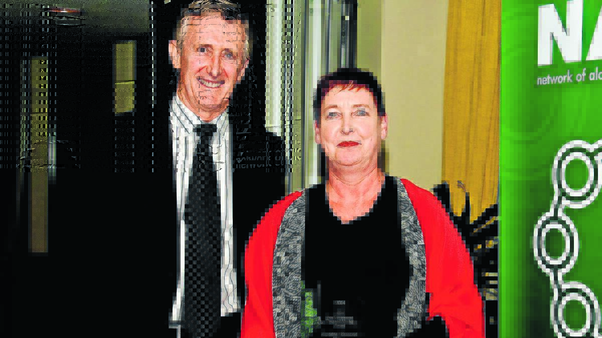 CHANGING LIVES: NSW Mental Health Commissioner John Feneley presents deputy chief executive officer of Lyndon Community Doctor Julaine Allan with an award recognising the organisation’s contribution to reducing drug and alcohol related harm. 
