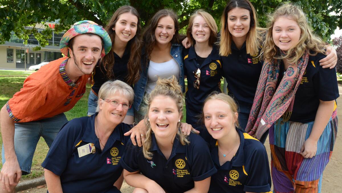 SCHOOLIES WITH A DIFFERENCE: Freshly returned from a trip to Nepal (back) Billy Thompson, Fleur Connick, Chloe Smith, Andie Delaney, Kandii Fuller and Maddie Lisle with (front) organiser Mary Brell and fellow travellers Lizzie Bilton and Maddy Dowd had their views of the world changed. 
Photo: JUDE  KEOGH 	1209nepa2