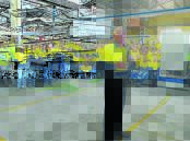 SAD FAREWELL: Electrolux general manager Mark O’Kane addresses staff after the last fridge rolled off the line on Monday.  