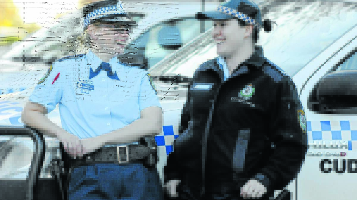 GIRL POWER: Canobolas Local Area Command relieving crime manager Detective Acting Inspector Yonneka Hill and Senior Constable Belinda Bostock are celebrating 100 years of women in policing with a relay and exhibition this month. Photo JUDE KEOGH.  
