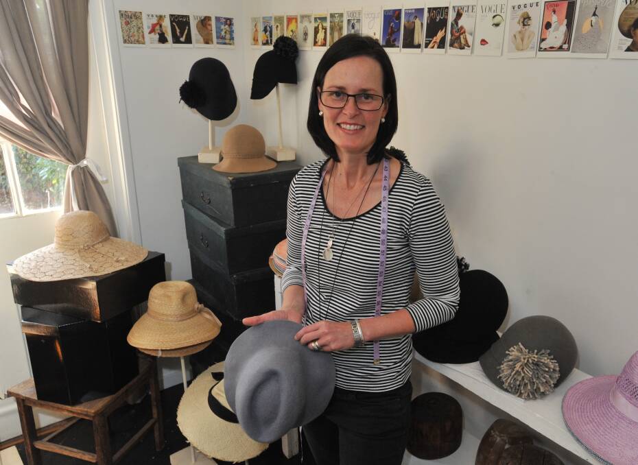 MARKET MADNESS: Fiona Schofield, of Fiona Schofield Millinery is busily preparing product to sell at the Millthorpe market tomorrow. Photo: JUDE KEOGH