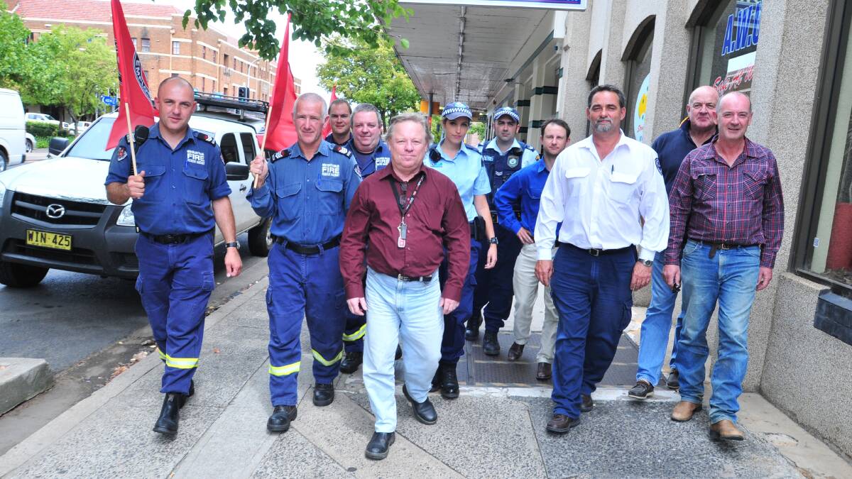 RALLYING TO THE CAUSE: Orange Country Labor president Gavin Hillier (fourth from the right) and the Central West Community Union Alliance's Bernard Fitzsimon (far right) ahead of the Mayday rally last year with James Patrech, Shane Brinkworth, Darren Gormly, Neil Hughes, Ian Lawless, RebelLindsay-Egan, Adam Webster, Joe Marric and Alan Haynes. Mr Fitzsimon will nominate for Labor pre-selection for the seat of Orange. Photo: JUDE KEOGH. 0321mayday1