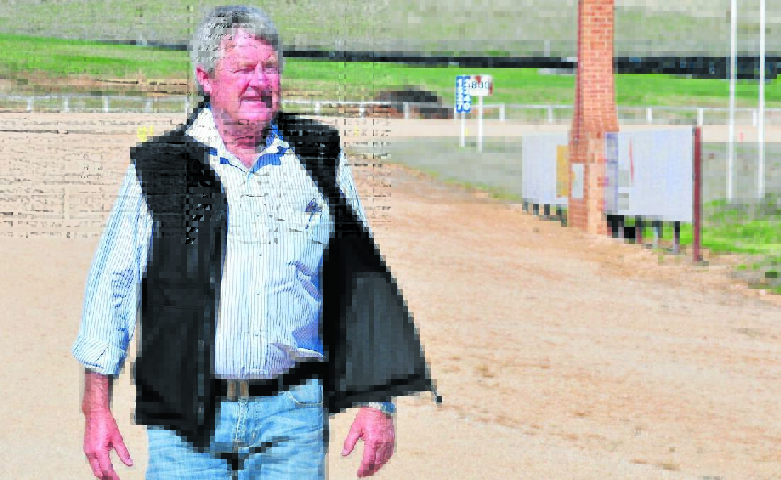 LET’S PACE OURSELVES: Frank McRae, at Highlands Paceway, says harness racing will continue in Orange despite the city losing its only two meetings to Bathurst next month.
Photo: JUDE KEOGH 