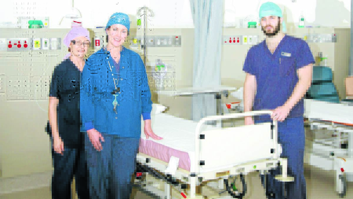 CHANGE FOR THE BETTER: Registered nurse Carolyn Gillespie, clinical nurse specialist Kath Whitehead and wardsman Zac Fraser in the new recovery area at Dudley Private Hospital. 
Photo: JEFF DEATH 0725jddudley01