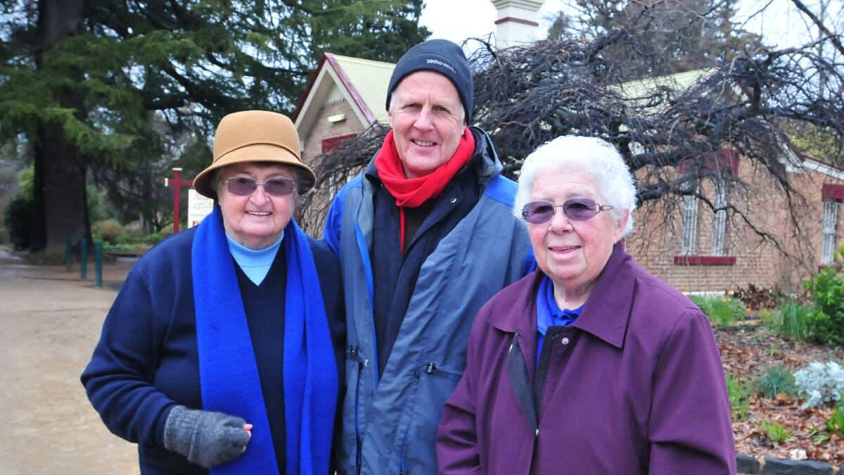 FLYING THE FLAG: Humanitarian advocates Sister Pat Linnane and Sister Mary Trainor with Cr Neil Jones who will support their move to have a peace pole reinstated in Cook Park. Photo: JUDE KEOGH
