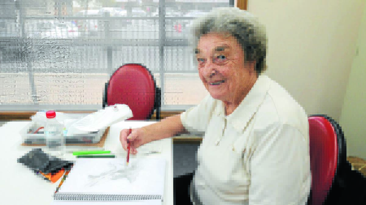 PLENTY ON OFFER: Thelma Tarn discovered a love of drawing eight years ago and through the U3A has developed her talents. She said it was important for seniors to get outside the house, meet people and keep your brain active. 
Photo: STEVE GOSCH 0217sgsenior
