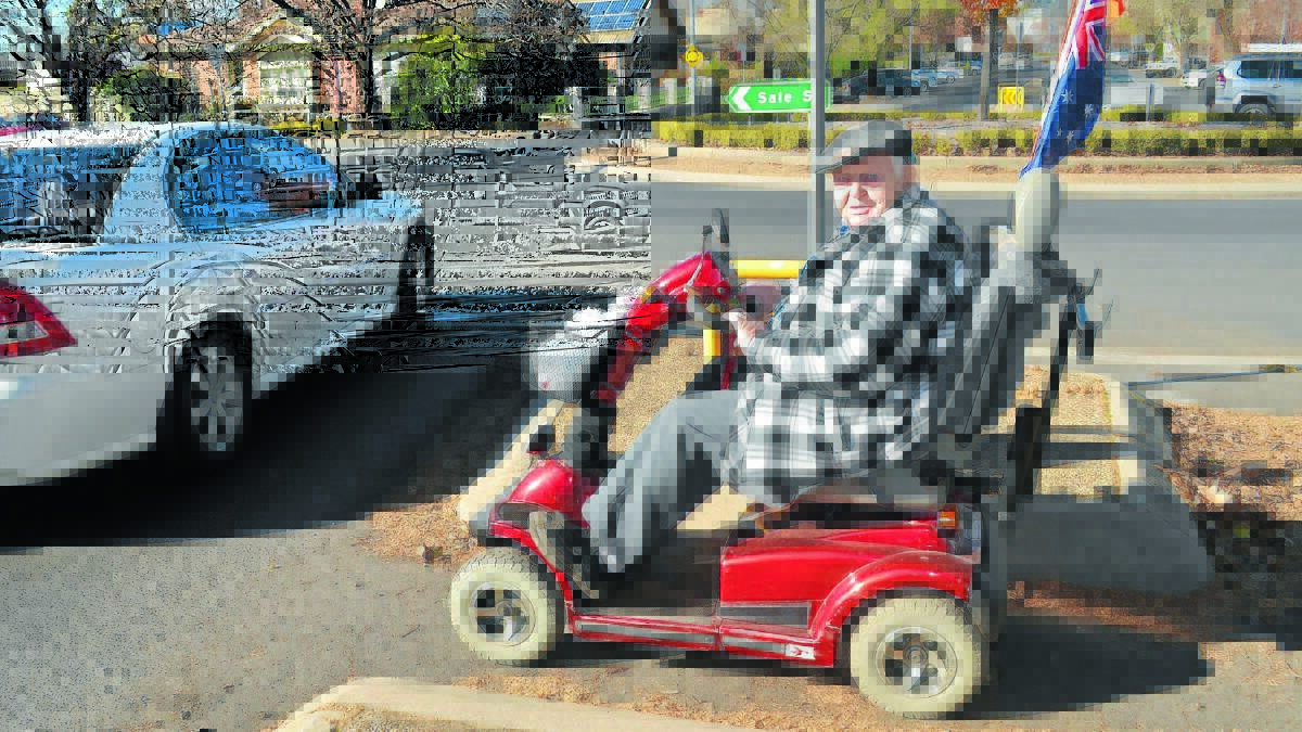 RIDING FOR A FALL: Ken Brown fears for his safety when he crosses at roundabouts, saying narrow refuges created safety risks for people using scooters, strollers or wheelchairs. Photo: DANIELLE CETINSKI                           0611dcken1