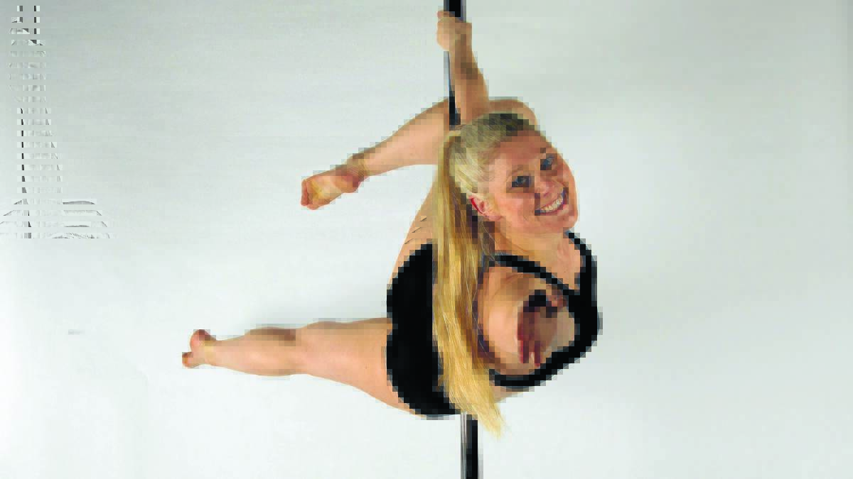 GOT THE HANG OF IT:  Lauren Barker practising for the Encore Sydney Pole Show.