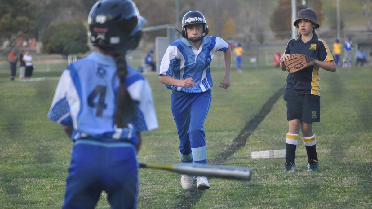 HEADING HOME: Eliza White steals home in Bletchington’s big Western Area win yesterday. Photo: NICK McGRATH 0521nmsoft6
