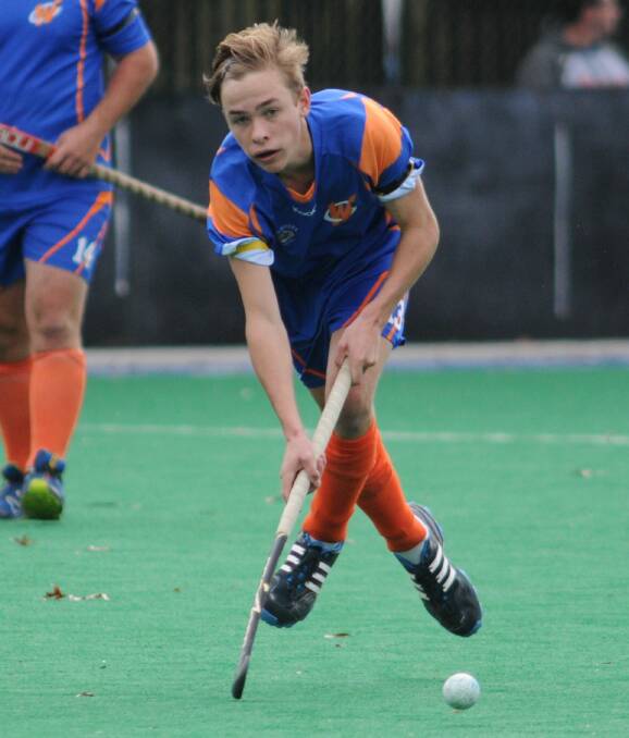 IN THE THICK OF IT: Hayden Dillon was a key player for Orange in the Hockey NSW Open Men's Division Two State Championships. Photo: STEVE GOSCH