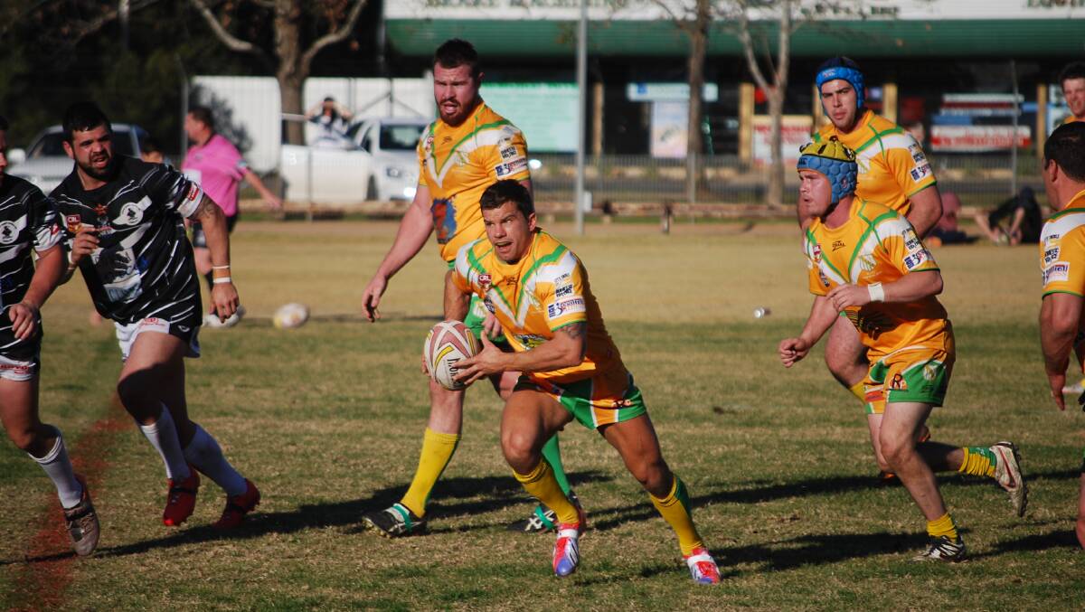 FULL OF RUNNING: Orange CYMS' Dan Stuart runs the ball in his side's Group 10 premier league loss to Cowra. Photo: PETER GUTHRIE