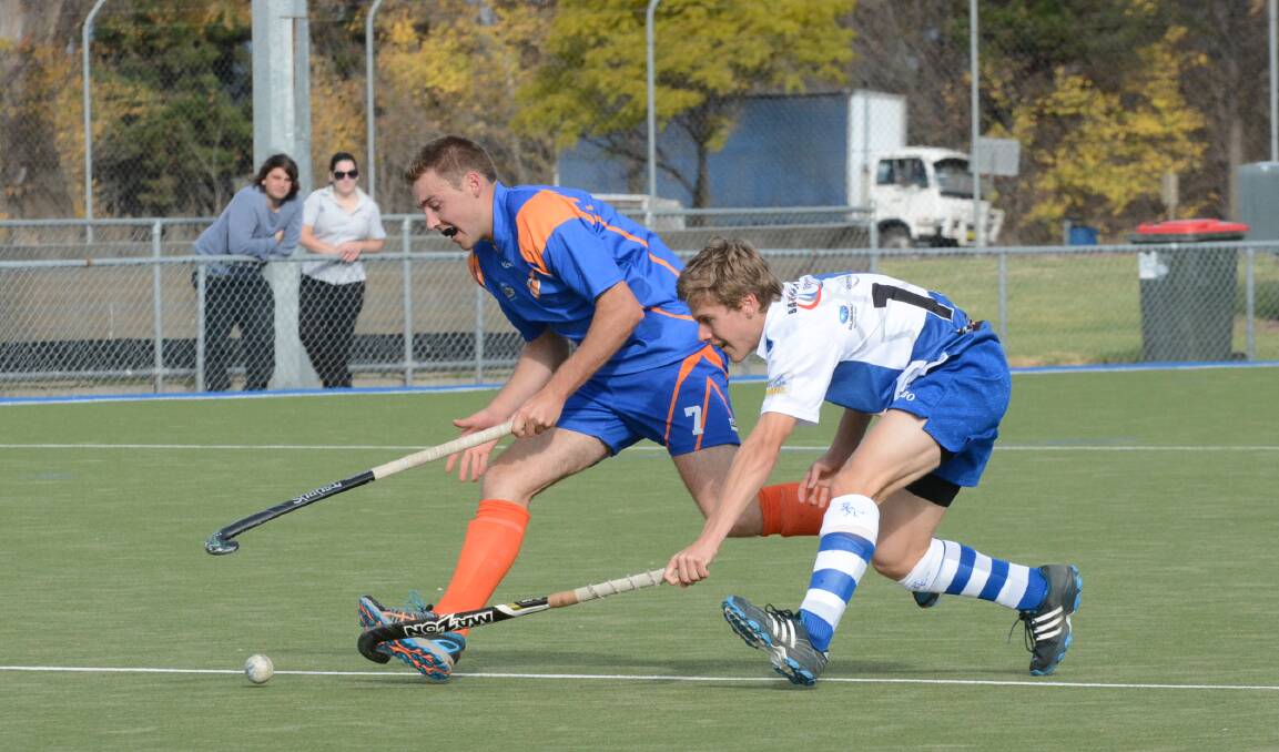 GAME ON: Nick Sharp takes on the St Pat's defence in their men's Premier League Hockey clash in Bathurst. Photo: PHILL MURRAY