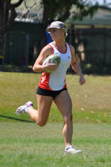 RAPID RISE: Liv Patterson, pictured playing touch for CSU, will represent NSW at the Women's National Rugby Sevens Championships in March. Photo: NIK GRANGER