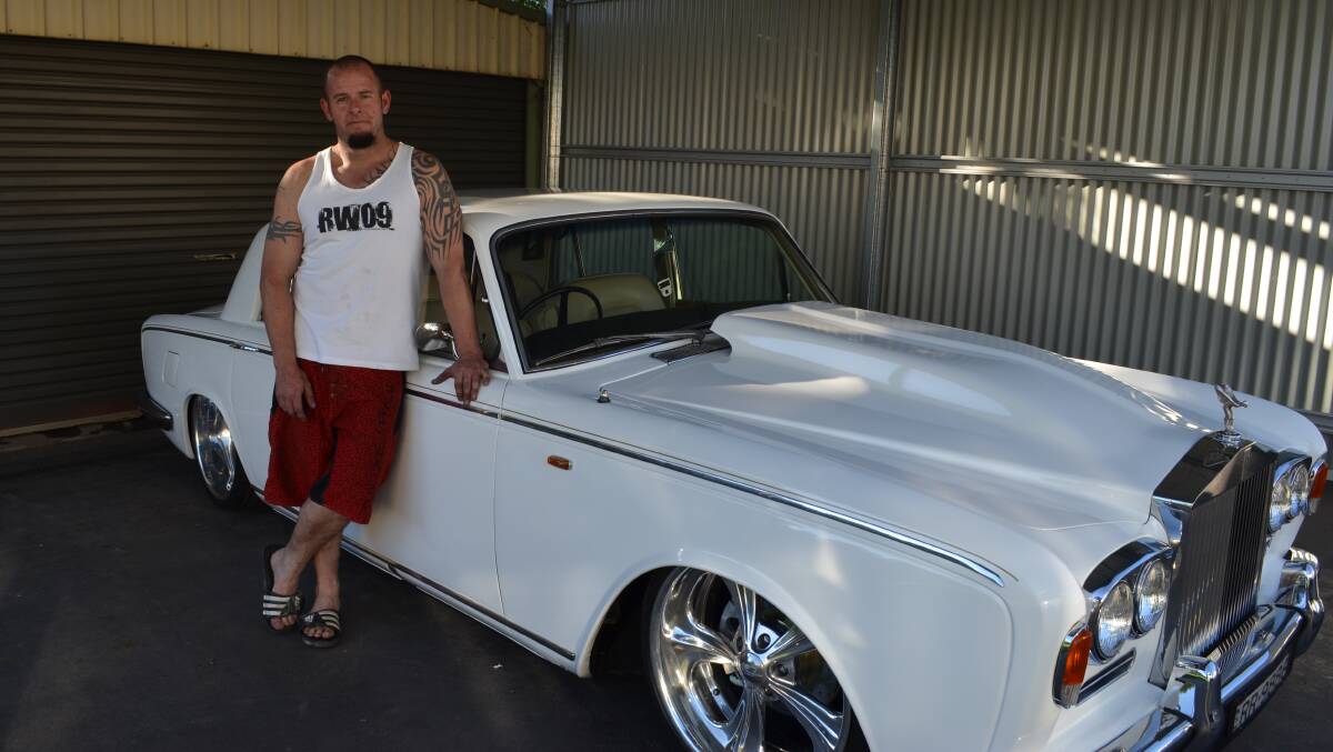 CAR ENTHUSIAST: Ben Crombie of Orange has taken his 1965 Rolls Royce Silver Shadow to the Summernats in Canberra this week. Photo: TANYA MARSCHKE 1231tmsummernats1
