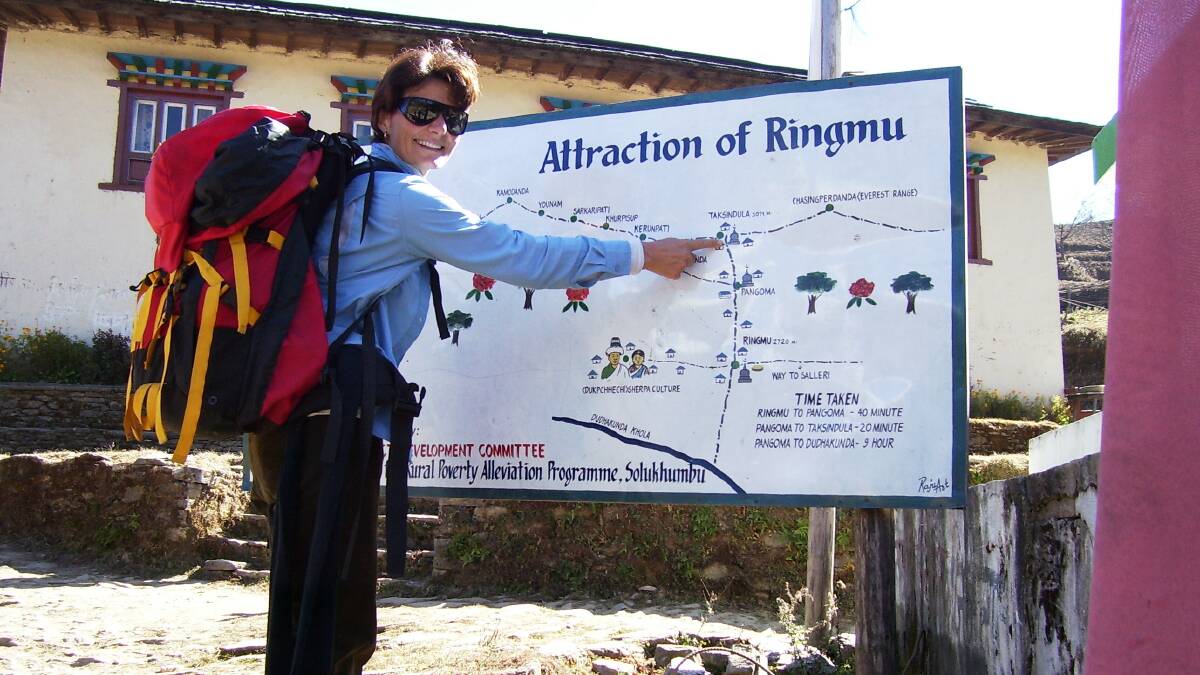 MOUNTAINOUS EFFORT: Former teacher Jeanine Gibby on a previous trip to Nepal. She’s about to make a fifth trip to help locals build a girls’ school dormitory out of bags of earth. Photo contributed