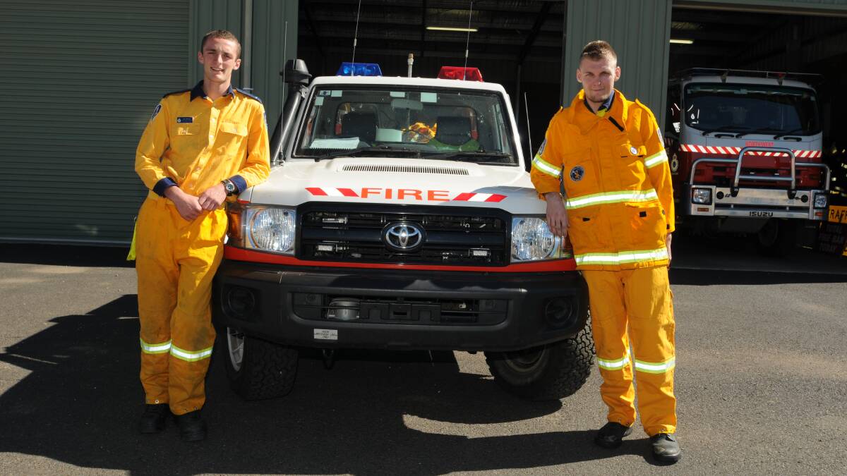 ON THE FRONT LINE: North West Rural Fire Service brigade members Ash Morrow and Brian O'Connor had a quieter bush fire danger season than usual.
Photo: JUDE KEOGH 0327fireseason3