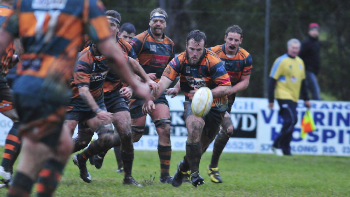 BULLS ON PARADE: Darcy Garlick will line up in Orange City's top grade side tomorrow after Harry Collins injured his knee. Photo: JUDE KEOGH 0614derby7