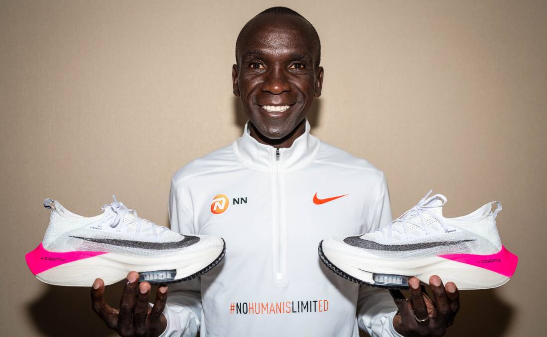 Running man: Eliud Kipchoge shows how pleased he is with his free shoes. Picture: Nike