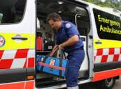 A generic photo of a paramedic lifting a bag out of an ambulance. Picture is from file 