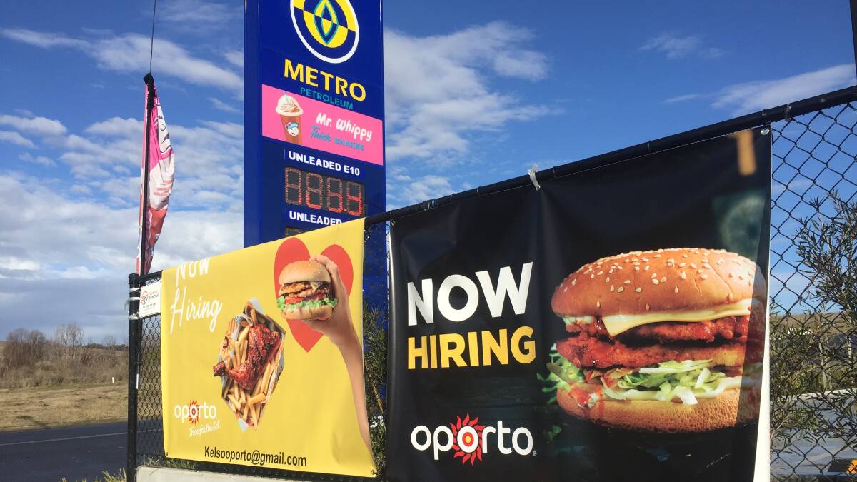 A CLEAR SIGN: 'Now hiring' signage for Oporto has surfaced at The Gateway development zone in Kelso, out the front of the site's Metro Petroleum outlet.
