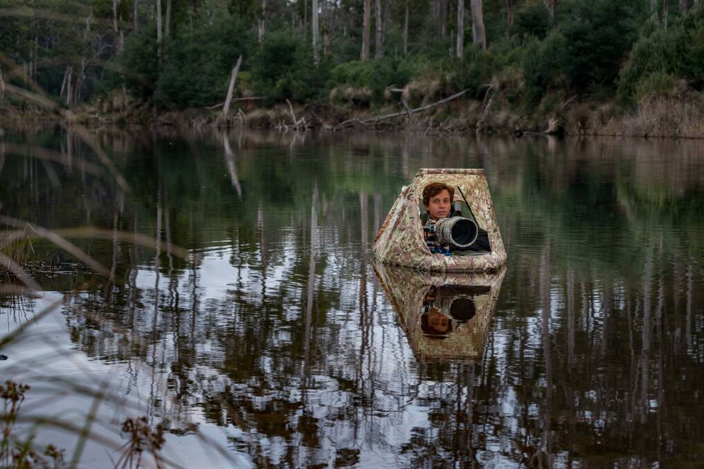 PERSPECTIVE: Daniel van Duinkerken built his own hide to take photos of platypus in Tasmanian waterways. Picture: Phillip Biggs