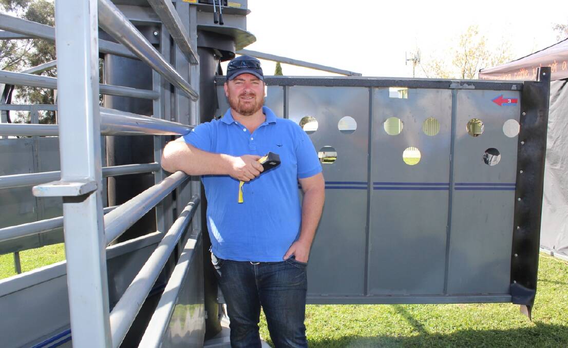 REMOTE CONTROL: Catagra Group manager Sean Hammond with the remote-controlled cattle crush which won The Land's Machine of the Year title. Photo: CONTRIBUTED