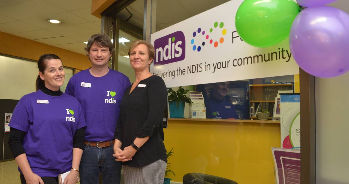 NDIS TEAM: Community engagement co-ordinator Lauren Cayeaux, regional manager Matt Eades and Social Futures people and quality executive manager Sam Albertini at Orange's NDIS office official opening on Monday. Photo: DECLAN RURENGA 1106drndis1