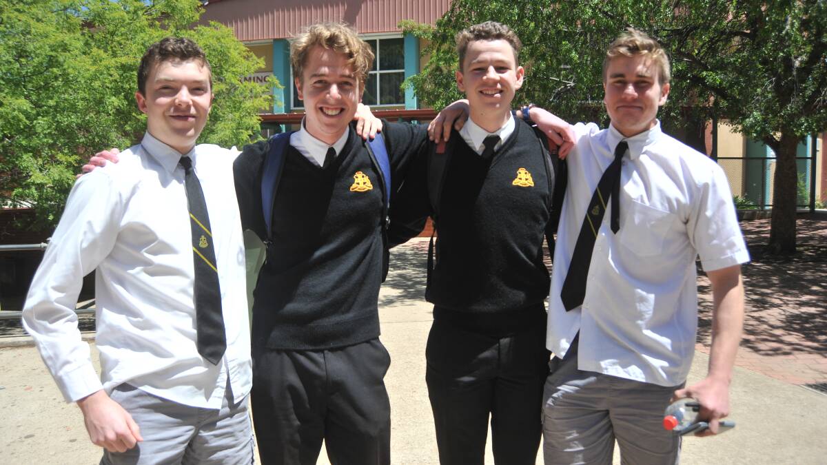 Orange High School students Christian Presslaber, Hugh Duffield, Thomas Zeylemaker and Bailey Goransson catch up after their HSC physics exams. Photo: JUDE KEOGH 1030jkhsc1