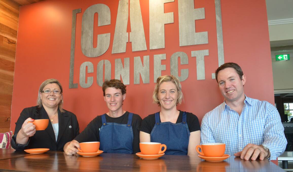 CONNECT OVER COFFEE: Newcastle Permanent's Sarah Bartimote, barista Oregen Watts, cafe owner Emma Murphy and Graham Batten from Newcastle Permanent. Photo: DECLAN RURENGA 0421drcafe1