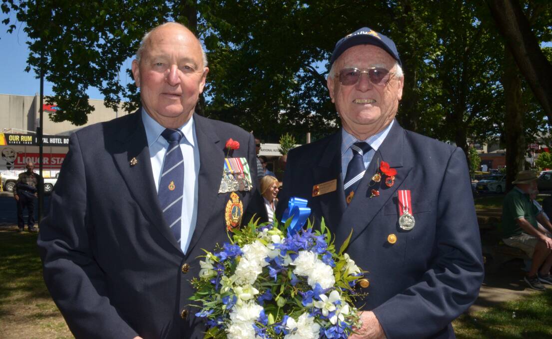 REMEMBRANCE: Tony White and Barry Collins ready to lay a wreath for the Orange Naval Association on Saturday. Photo: DECLAN RURENGA 1111drremem1