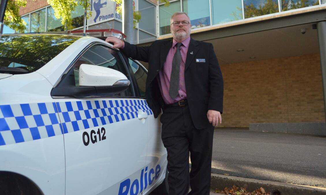 LESS CRIME: Canobolas LAC acting crime manager Detective Sergeant Andy McLean said the city's CCTV cameras had helped cut crime in Orange, despite a spike in armed robbery.  Photo: DECLAN RURENGA 0404drmclean5