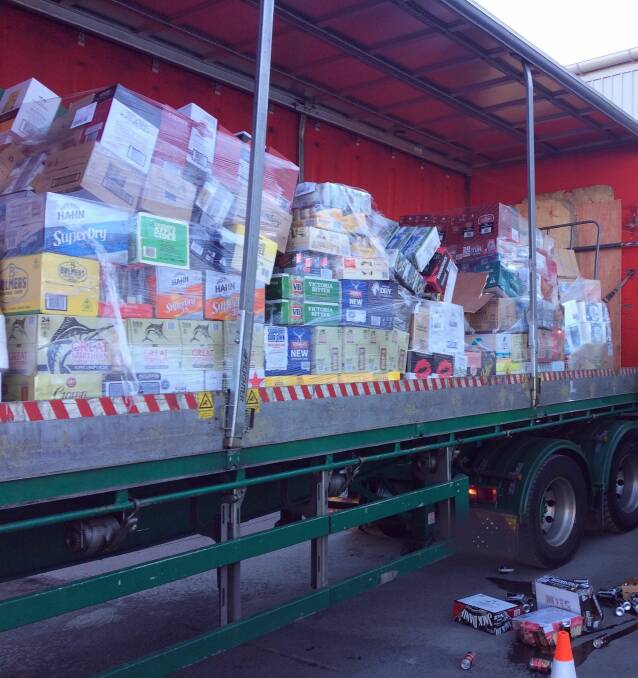 NSW Police and the RMS conducted a safety inspection following an accident on the M1 at Ron Finemore Transport's Orange depot on Wednesday, and took this photograph of "ineffective" loading practises. Photo: NSW POLICE