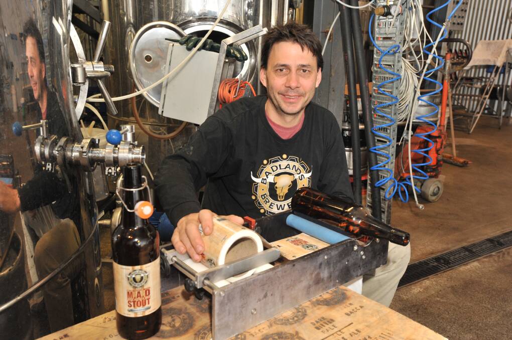MAD BREW: Brewer Jon Shiner prepares MAD Stout bottles for the Great Australian Beer Spectacular.