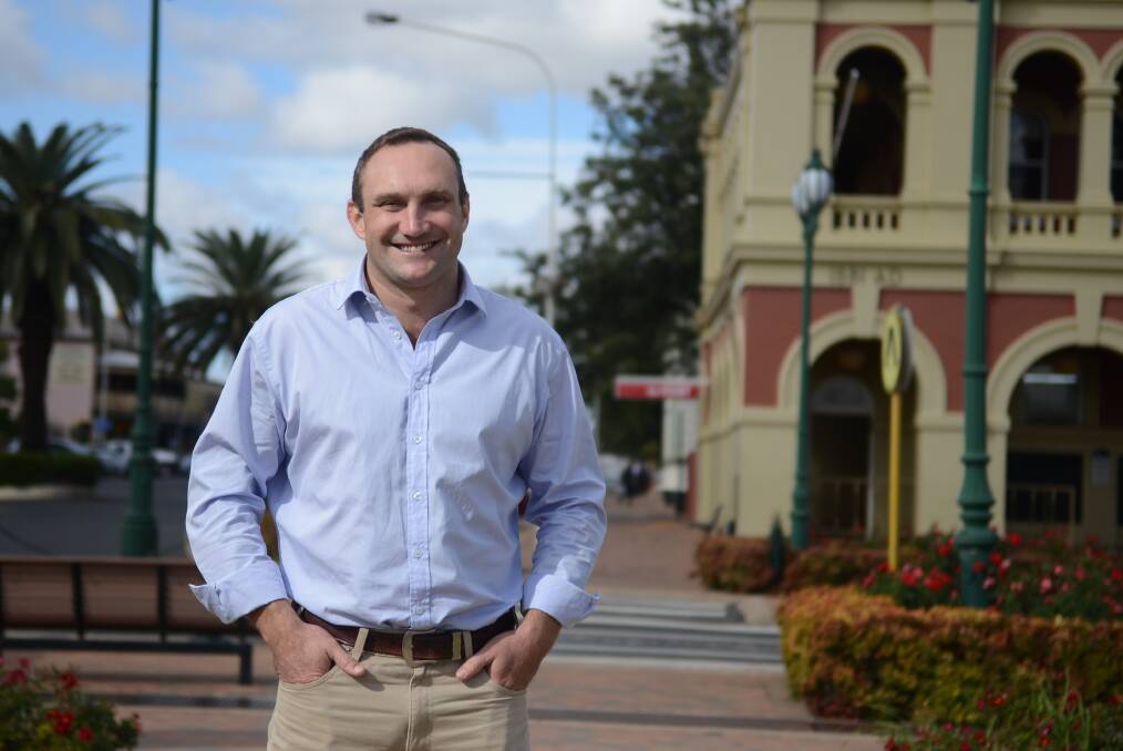 Scott Barrett was campaigning in Forbes on Tuesday as bookies offered $1.03 for him to win the seat of Orange. Photo: RENEE POWELL
